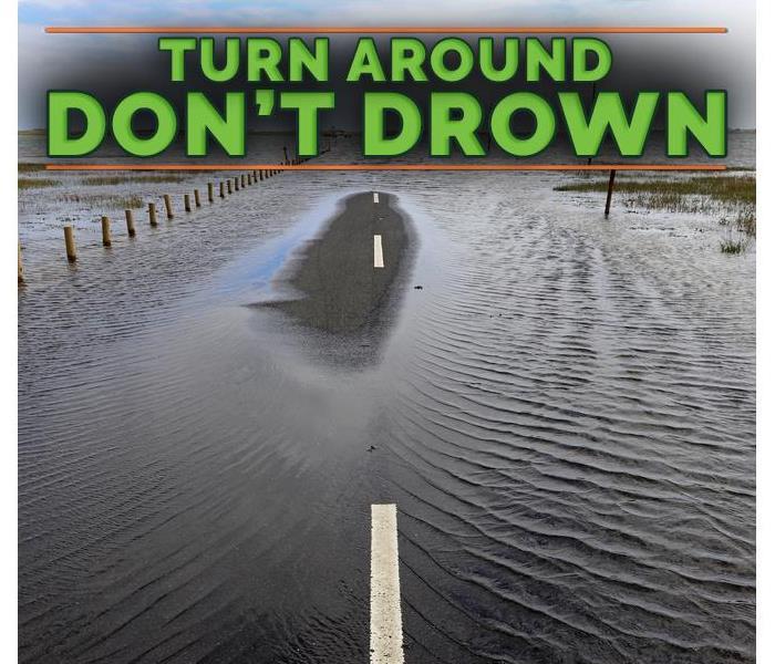 Flooded roadway on top of the picture says "Turn around, don't drown"
